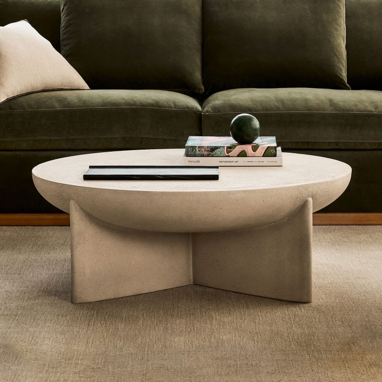 a stone based coffee table thats a statement addition in your living room space